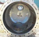 Used Wolfe Mechanical and Equipment Single Pass Shell and Tube Heat Exchanger, 1285 square feet, vertical. 304 Stainless steel shell rated 100 psi at 300 degrees F. (656) 3/4