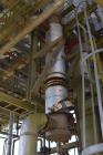 Used Yula Single Pass Shell & Tube Heat Exchanger, Approximately 196 Square Feet, Model WC-1E-96BS, Vertical. Carbon steel shell rated 200 psi at 40 to 400 degrees F. (125) 3/4” diameter x 96” long 3...