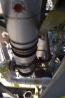 Used Yula Single Pass Shell & Tube Heat Exchanger, Approximately 196 Square Feet, Model WC-1E-96BS, Vertical. Carbon steel shell rated 200 psi at 40 to 400 degrees F. (125) 3/4” diameter x 96” long 3...