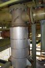 Used Yula Single Pass Shell & Tube Heat Exchanger, Approximately 196 Square Feet, Model WC-1E-96BS, Vertical. Carbon steel shell rated 200 psi at 40 to 400 degrees F. (125) 3/4” diameter x 96” long 3...
