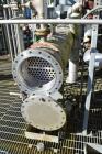 Used Yula 2 Pass Shell & Tube Heat Exchanger, Approximately 238 Square Feet, Model WC-2F-240CS, 304L Stainless Steel, Horizontal. 304L Stainless steel shell rated 150 psi at 40 to 375 degrees F. (76)...