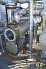 Used Yula 2 Pass Shell & Tube Heat Exchanger, Approximately 238 Square Feet, Model WC-2F-240CS, 304L Stainless Steel, Horizontal. 304L Stainless steel shell rated 150 psi at 40 to 375 degrees F. (76)...
