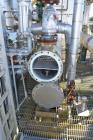 Used Yula 2 Pass Shell & Tube Heat Exchanger, Approximately 238 Square Feet, Model WC-2F-240CS, 304L Stainless Steel, Horizontal. 304L Stainless steel shell rated 150 psi at 40 to 375 degrees F. (76)...