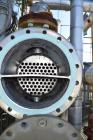 Used Yula 2 Pass Shell & Tube Heat Exchanger, Approximately 238 Square Feet, Model WC-2F-240CS, 304L Stainless Steel, Horizontal. 304L Stainless steel shell rated 150 psi at 40 to 375 degrees F. (76)...