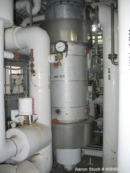 Used 318 square foot Ketema shell and tube heat exchanger. 316L stainless steel tubes, tube sheets and bonnets with (432) 5/8" diameter x 4' 6" long tubes rated 50 psi at 170 F, carbon steel shell ra...