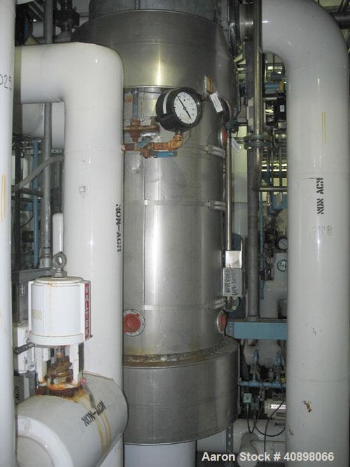 Used One (1) used 318 square foot Ketema shell and tube heat exchanger. 316L stainless steel tubes, tube sheets and bonnets with (432) 5/8" diameter x 4' 6" long tubes rated 50 psi at 170 F, carbon s...