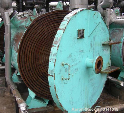 Used: American Heat Reclaim spiral heat exchanger, 1,690 square feet, type 1-H, carbon steel heads.  Internal: carbon steel, rated 100 psi @ 200 deg F/ -20 deg F @ 150 psi. Year 1977, serial #12105, ...