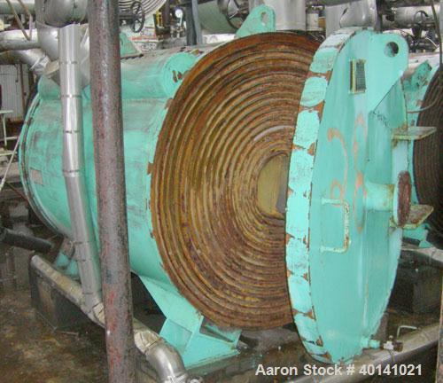 Used: American Heat Reclaim spiral heat exchanger, 1,690 square feet,  type 1-H, carbon steel heads. Internal carbon steel, rated 100 psi @ 200 deg F/ -20 deg F @ 150 psi. Year 1977, serial #12103, N...