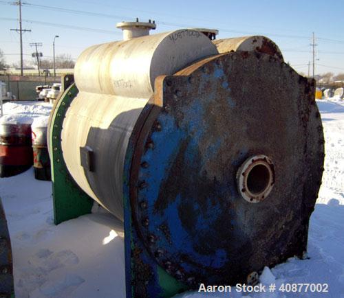 Used APV International Limited Horizontal Spiral Heat Exchanger, Type 1. 2413 square feet, 316 stainless steel shell. Hot and cold side rated 85 psi at 230 deg F. Carbon steel removable heads. Openin...