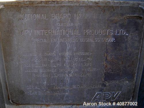 Used APV International Limited Horizontal Spiral Heat Exchanger, Type 1. 2413 square feet, 316 stainless steel shell. Hot and cold side rated 85 psi at 230 deg F. Carbon steel removable heads. Openin...