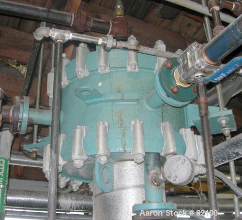 USED: Alfa Laval Spiral Heat Exchanger, 50 square feet, model 1-C, 304 stainless steel on product contact. Rated 75 psi at 400 deg F. Openings: hot side inlet/outlet 3"/2"; cold side inlet/outlet 2";...