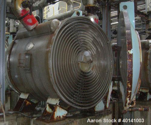 Used Alfa Laval Thermal Horizontal Spiral Heat Exchanger, model 1H. 860 square feet, 316L stainless steel product contact areas. Hot and cold side rated 150 psi at 200 deg F. Carbon steel removable h...