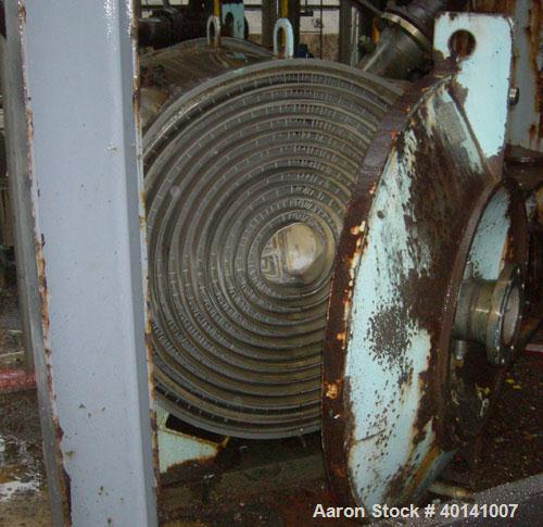 Used Alfa Laval Thermal Horizontal Spiral Heat Exchanger, Model 1H. 495 Square feet, 316L stainless steel product contact areas. Hot and cold side rated 150 psi at 275 deg F. Carbon steel removable h...