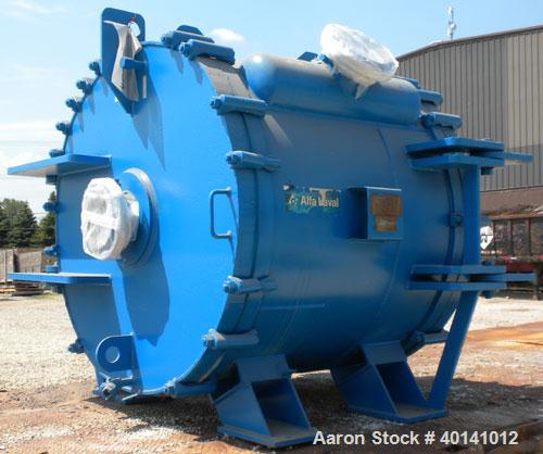 Used Alfa Laval Thermal Horizontal Spiral Heat Exchanger, model 1H, 1400 square feet, 316L stainless steel product contact areas. Hot and cold side rated 150 psi at 250 deg F. Carbon steel removable ...