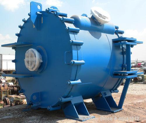 Used Alfa Laval Thermal Horizontal Spiral Heat Exchanger, model 1H, 1400 square feet, 316L stainless steel product contact areas. Hot and cold side rated 150 psi at 250 deg F. Carbon steel removable ...