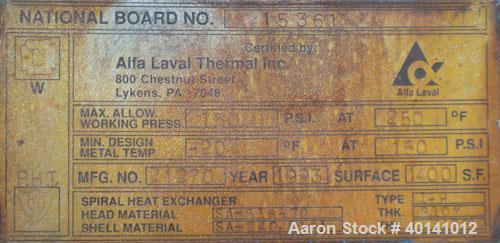Used Alfa Laval Thermal Horizontal Spiral Heat Exchanger, model 1H, 1400 square feet, 316L stainless steel product contact areas. Hot and cold side rated 150 psi at 250 deg F. Carbon steel removable ...