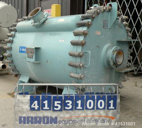 Used Alfa Laval Horizontal Spiral Heat Exchanger, Model 1-H, 930 Square Feet, 316L Stainless Steel Product Contact Areas. Hot and cold side rated 100 psi at 200 deg F and 20 deg F at 100 psi. Carbon ...
