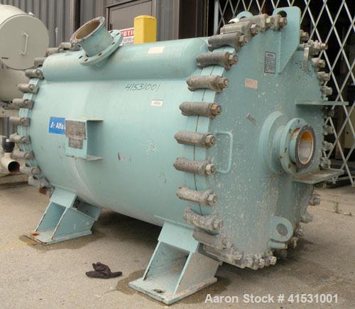 Used Alfa Laval Horizontal Spiral Heat Exchanger, Model 1-H, 930 Square Feet, 316L Stainless Steel Product Contact Areas. Hot and cold side rated 100 psi at 200 deg F and 20 deg F at 100 psi. Carbon ...