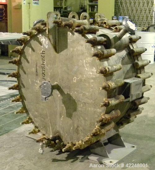 Used Alfa Laval Spiral Heat Exchanger, type 1-H, 345 square feet, 304L stainless steel. Rated 165 and full vacuum at 400 degrees F. Stainless steel sheathed with insulation. Openings: 1-1/2" inlet/ou...