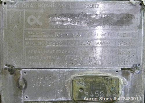 Used Alfa Laval Spiral Heat Exchanger, type 1-H, 345 square feet, 304L stainless steel. Rated 165 and full vacuum at 400 degrees F. Stainless steel sheathed with insulation. Openings: 1-1/2" inlet/ou...