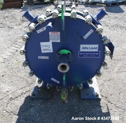 Used Alfa-Laval Spiral Heat Exchanger, 75 Square Feet, Type 1-H. Hastelloy C 276 product contact surfaces, rated 100 psi at +300 / -7 degrees F. Serial# 24380, built 2001.