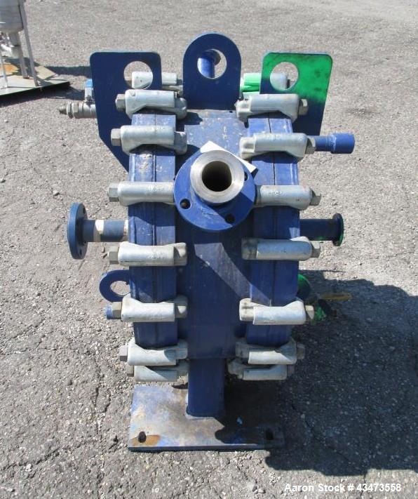 Used Alfa-Laval Spiral Heat Exchanger, 75 Square Feet, Type 1-H. Hastelloy C 276 product contact surfaces, rated 100 psi at +300 / -7 degrees F. Serial# 24380, built 2001.