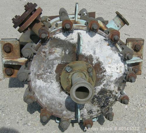 Used Alfa Laval Thermal vertical spiral heat exchanger, model 1C, 25 square feet, stainless steel product contact areas. Hot and cold side rated 150 psi at 400 deg F. Carbon steel removable heads. Op...