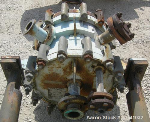 Used Alfa Laval Thermal vertical spiral heat exchanger, model 1C, 25 square feet, stainless steel product contact areas. Hot and cold side rated 150 psi at 400 deg F. Carbon steel removable heads. Op...