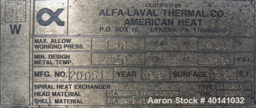 Used Alfa Laval Thermal vertical spiral heat exchanger, model 1C, 25 square feet, stainless steel product contact areas. Hot and cold side rated 150 psi at 400 deg F. Carbon steel removable heads. Op...