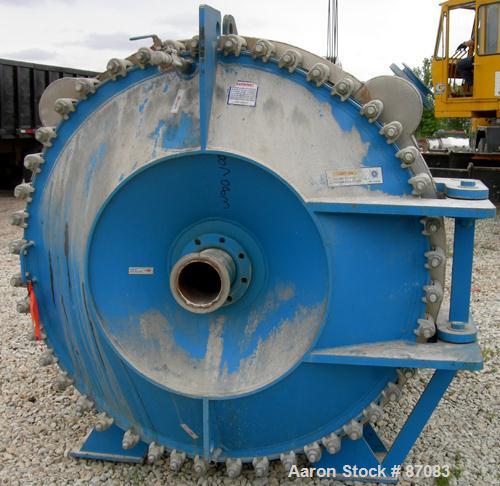 USED: Alfa Laval horizontal spiral heat exchanger, model 1H, 2200 square feet, 316/316L stainless steel product contact areas. Rated 100 psi/FV at 300 deg F. Hinged carbon steel removable heads. Open...