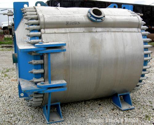 USED: Alfa Laval horizontal spiral heat exchanger, model 1H, 2200 square feet, 316/316L stainless steel product contact areas. Rated 100 psi/FV at 300 deg F. Hinged carbon steel removable heads. Open...