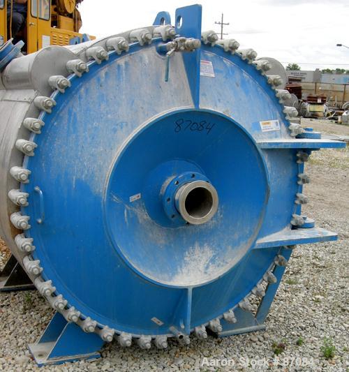 USED: Alfa Laval horizontal spiral heat exchanger, model 1H, 2200 square feet, 316/316L stainless steel product contact areas. Rated 100 psi/FV at 300 deg F. Hinged carbon steel removable heads. Open...