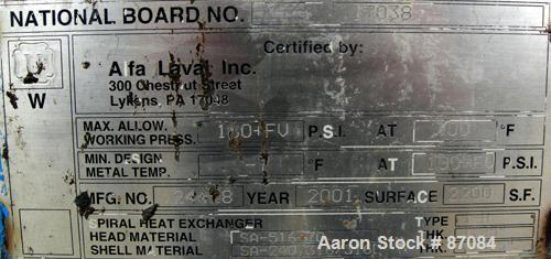 USED: Alfa Laval horizontal spiral heat exchanger, model 1H, 2200 square feet, 316/316L stainless steel product contact areas. Rated 100 psi/FV at 300 deg F. Hinged carbon steel removable heads. Open...