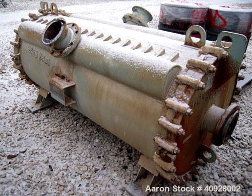 Used Alfa Laval Spiral Heat Exchanger, 860 square feet, 316 stainless steel.  Type 1-H.  188 USG capacity.  Rated 50 psi @ 300 deg F.    Heads: Type 516-70 carbon steel.  Shell is 316 stainless steel.