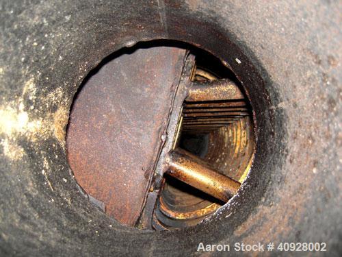 Used Alfa Laval Spiral Heat Exchanger, 860 square feet, 316 stainless steel.  Type 1-H.  188 USG capacity.  Rated 50 psi @ 300 deg F.    Heads: Type 516-70 carbon steel.  Shell is 316 stainless steel.