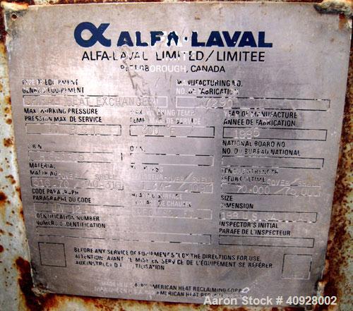 Used Alfa Laval Spiral Heat Exchanger, 860 square feet, 316 stainless steel.  Type 1-H.  188 USG capacity.  Rated 50 psi @ 300 deg F.    Heads: Type 516-70 carbon steel.  Shell is 316 stainless steel.