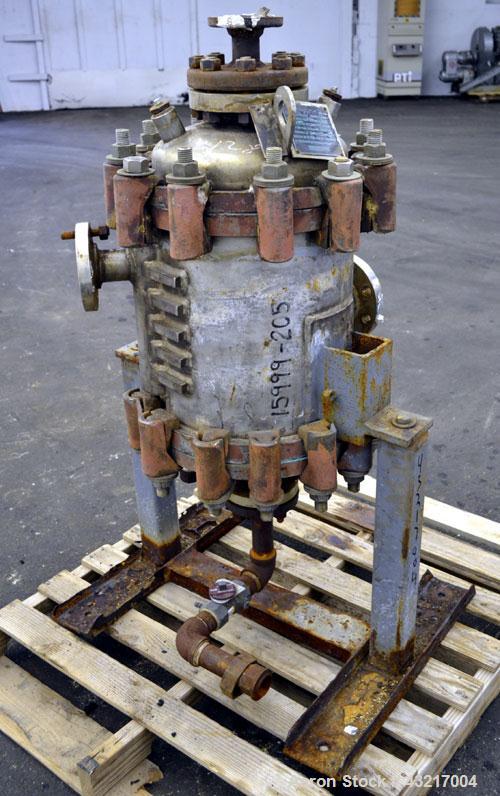 Used American Heat Reclaiming Vertical Spiral Heat Exchanger, Type 1-V, 30 Square Feet. 304 Stainless steel. Hot and cold side rated 75 psi at -20 to 1250 degrees F. Removable heads. Inner pass cross...