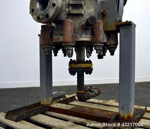 Used American Heat Reclaiming Vertical Spiral Heat Exchanger, Type 1-V, 30 Square Feet. 304 Stainless steel. Hot and cold side rated 75 psi at -20 to 1250 degrees F. Removable heads. Inner pass cross...
