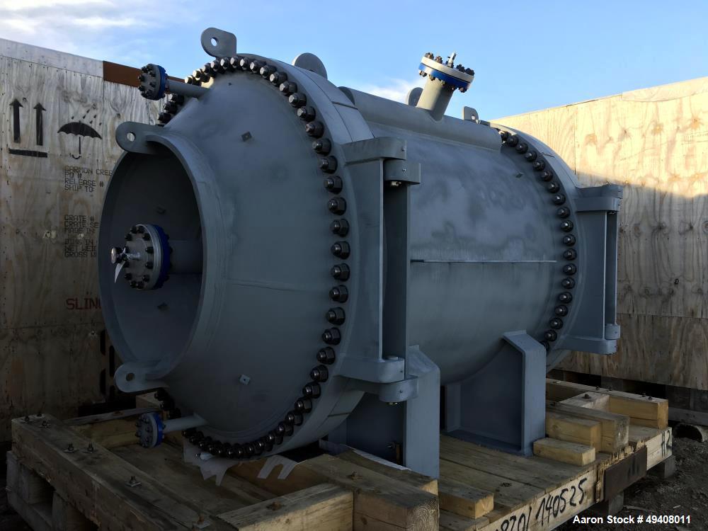 Unused- Tranter Spiral Heat Exchanger. Diameter 1920 mm. Length 2003 mm. Max pressure FV/355 psi. Temperature -45/200 C. Actual surface area 2580 feet squared. Effective surface area 2454 feet square...