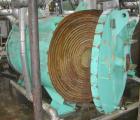 Used: American Heat Reclaim spiral heat exchanger, 1,690 square feet,  type 1-H, carbon steel heads. Internal carbon steel, rated 100 psi @ 200 deg F/ -20 deg F @ 150 psi. Year 1977, serial #12103, N...