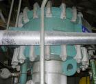 USED: Alfa Laval Spiral Heat Exchanger, 50 square feet, model 1-C, 304 stainless steel on product contact. Rated 75 psi at 400 deg F. Openings: hot side inlet/outlet 3