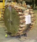 Used Alfa Laval Spiral Heat Exchanger, type 1-H, 345 square feet, 304L stainless steel. Rated 165 and full vacuum at 400 degrees F. Stainless steel sheathed with insulation. Openings: 1-1/2