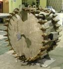 Used Alfa Laval Spiral Heat Exchanger, type 1-H, 345 square feet, 304L stainless steel. Rated 165 and full vacuum at 400 degrees F. Stainless steel sheathed with insulation. Openings: 1-1/2