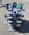 Used Alfa-Laval Spiral Heat Exchanger, 75 Square Feet, Type 1-H. Hastelloy C 276 product contact surfaces, rated 100 psi at +300 / -7 degrees F. Serial# 24380, built 2001.