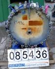 USED: Alfa Laval horizontal spiral heat exchanger, model 1-H, 172 square feet, 316 stainless steel product contact areas, carbon steel head. Rated 150 psi at 550 deg F, removable ends. Openings: hot ...