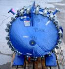 USED: Alfa Laval horizontal spiral heat exchanger, model 1-H, 172 square feet, 316 stainless steel product contact areas, carbon steel head. Rated 150 psi at 550 deg F, removable ends. Openings: hot ...