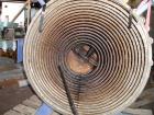 USED: Alfa Laval horizontal spiral heat exchanger, model 1-H, 172 square feet, 316 stainless steel product contact areas, carbon steel head. Rated 150 psi at 550 deg F, removable ends. Openings: hot ...