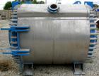 USED: Alfa Laval horizontal spiral heat exchanger, model 1H, 2200 square feet, 316/316L stainless steel product contact areas. Rated 100 psi/FV at 300 deg F. Hinged carbon steel removable heads. Open...