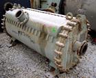 Used Alfa Laval Spiral Heat Exchanger, 860 square feet, 316 stainless steel.  Type 1-H.  188 USG capacity.  Rated 50 psi @ 300 deg F.    Heads: Type 516-70 carbon steel.  Shell is 316 stainless steel.