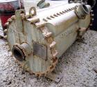 Used Alfa Laval Spiral Heat Exchanger, 860 square feet, 316 stainless steel.  Type 1-H.  188 USG capacity.  Rated 50 psi @ 300 deg F.    Heads: Type 516-70 carbon steel.  Shell is 316 stainless steel.